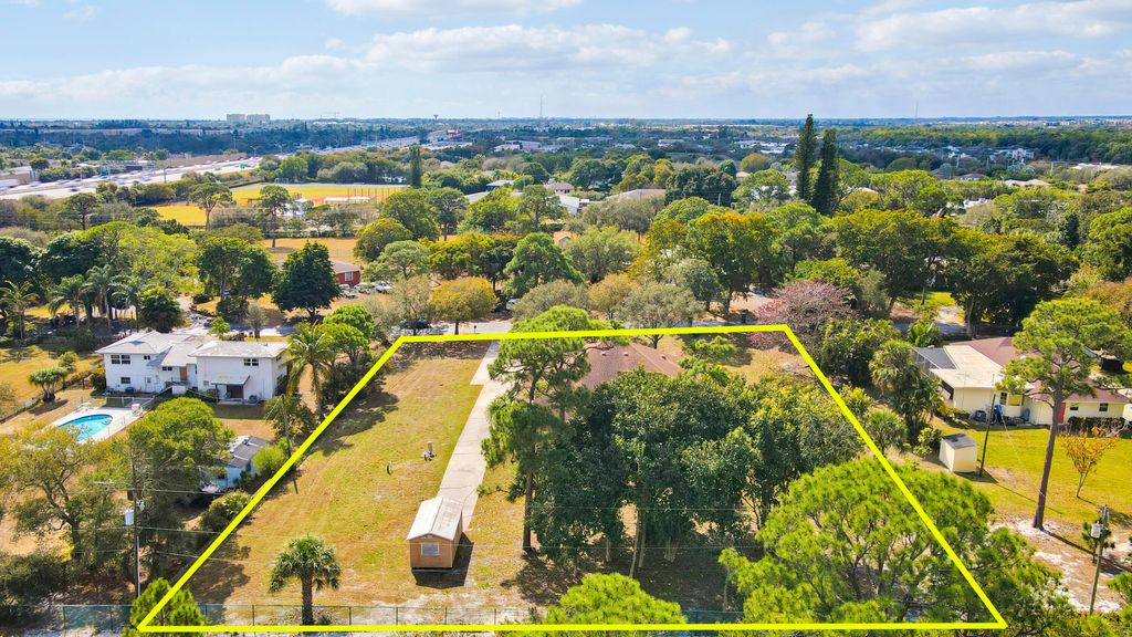 Photo of 1859 Tom A Toe Road, Boynton Beach, FL 33426 (MLS # R11163601)