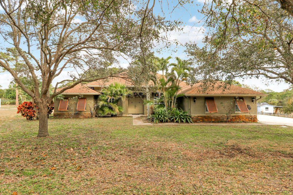 Photo of 1859 Tom A Toe Road, Boynton Beach, FL 33426 (MLS # R11163601)