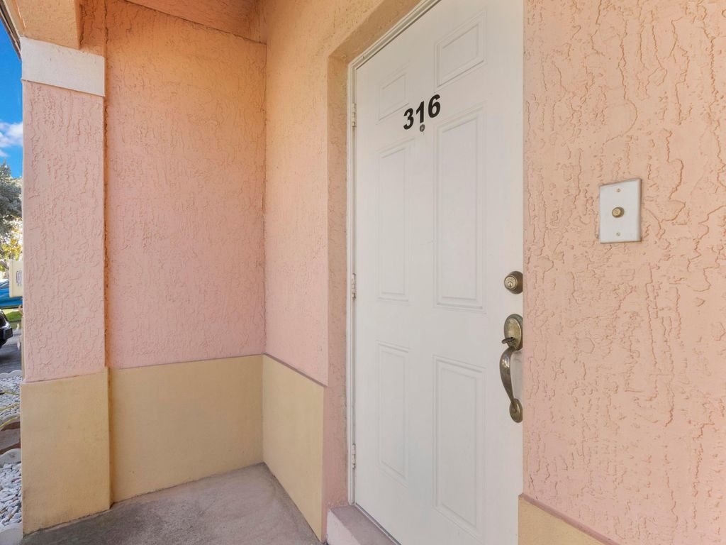 Photo of 316 Talia Circle, Palm Springs, FL 33461 (MLS # R11117111)