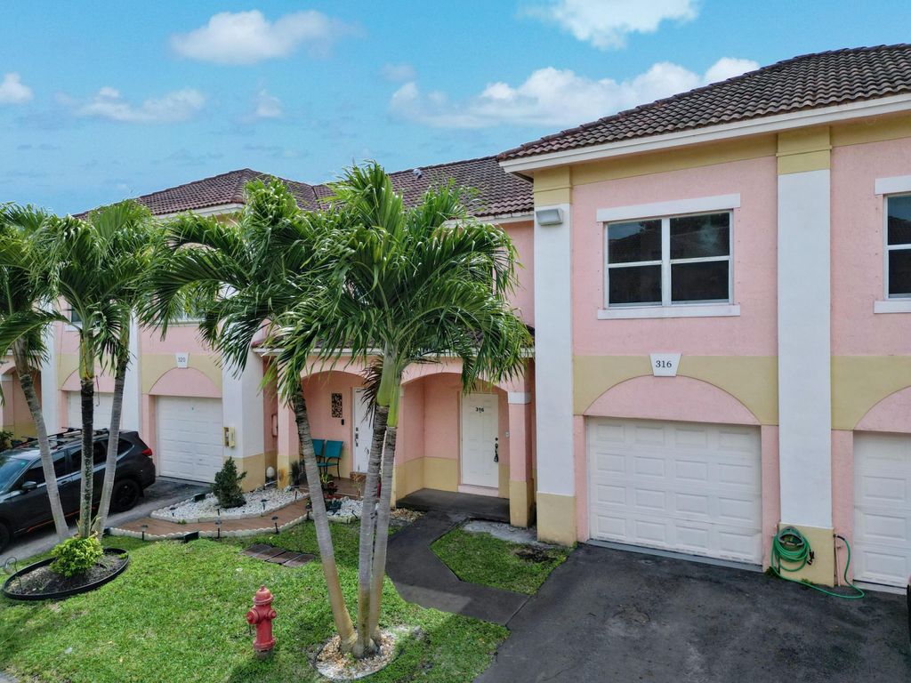 Photo of 316 Talia Circle, Palm Springs, FL 33461 (MLS # R11117111)