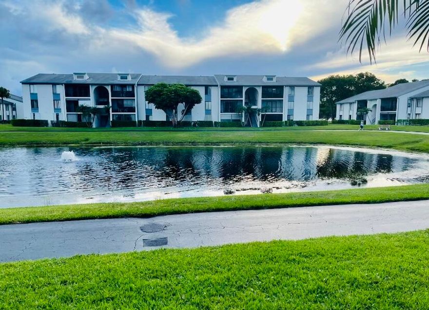 Amazing waterfront location on this desirable first floor unit, located in a beautifully landscaped gated community, so convenient to everything right in the heart of town. Tile throughout living areas, Berber in bedrooms, largest 2 bed unit with eat in kitchen and full separate laundry room. updated kitchen cabinets,  counters and bathroom vanities. Vacant and ready to move in! Perfect
(No rental first year of ownership)