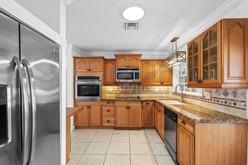 Photo of 7823 Griswold Street, Lantana, FL 33462 (MLS # R10981070)