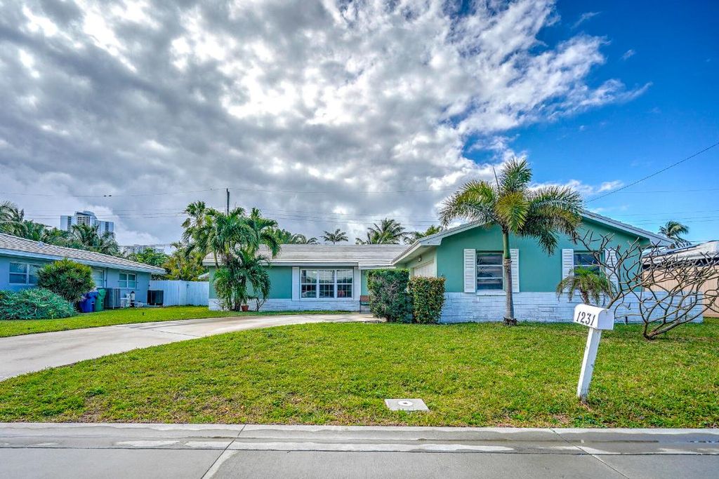 Photo of 1231 Manor Drive, Singer Island, FL 33404 (MLS # R10954647)