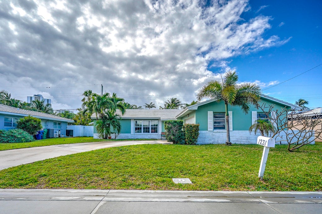 Photo of 1231 Manor Drive, Singer Island, FL 33404 (MLS # R10954647)