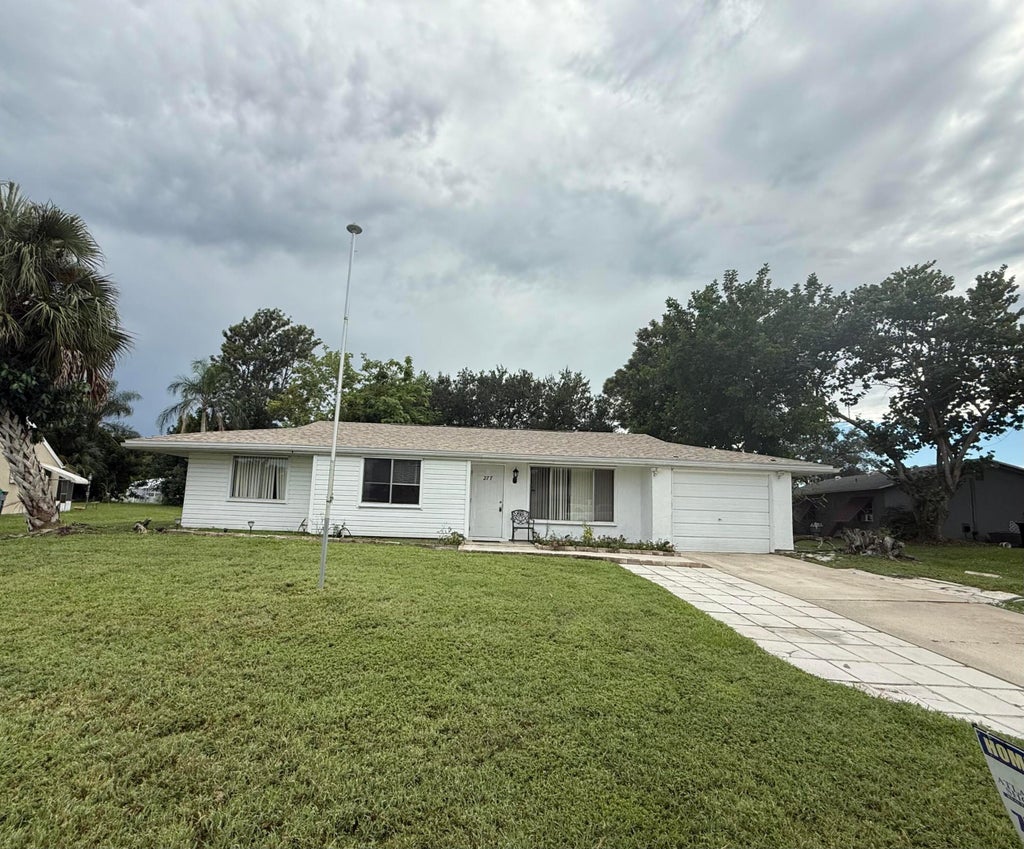 Photo of 277 SW Kimball Circle, Port Saint Lucie, FL 34953 (MLS # R11074139)