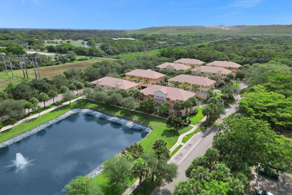 Photo of 3915 Passion Flower Road #3915, Coconut Creek, FL 33073 (MLS # F10506056)