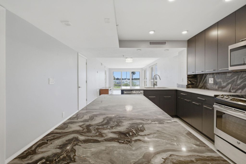 Photo of 3901 S Flagler Drive #203, West Palm Beach, FL 33405 (MLS # B26021597)