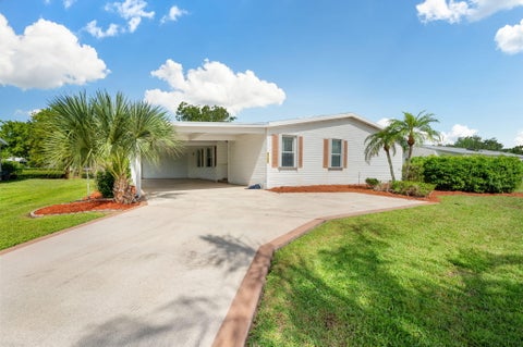 Photo of 8185 14TH HOLE Drive, Port Saint Lucie, FL 34952 (MLS # B26069722)