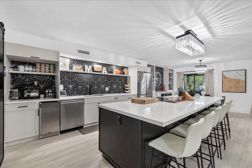 Spacious 2170sq ft 3 bedroom 2.5 bath  lakefront townhome in Trellises. This home has been completed remodeled. Dream kitchen w island & a true walk in pantry. Primary bdrm w vaulted ceilings has huge walk in custom closet  w a separate sitting/office area & private balcony overlooking Lake & fabulous view of the pool & clubhouse. Second bdrm upstairs has own ensuite  bath & walk in closet. 3rd bedroom is downstairs.  2 -2020 Ac units. New flat roof over screened in patio overlooking the lake downstairs. Tankless water heater. All new appliances. This place has it all! Centrally located near 595, near Broward Mall, Tower Shops, & Jacaranda golf course. Amenities include pool, clubhouse, gym, pickleball, tennis, basketball, sauna. Pets allowed. Seller offering concession/credit to Buyer !