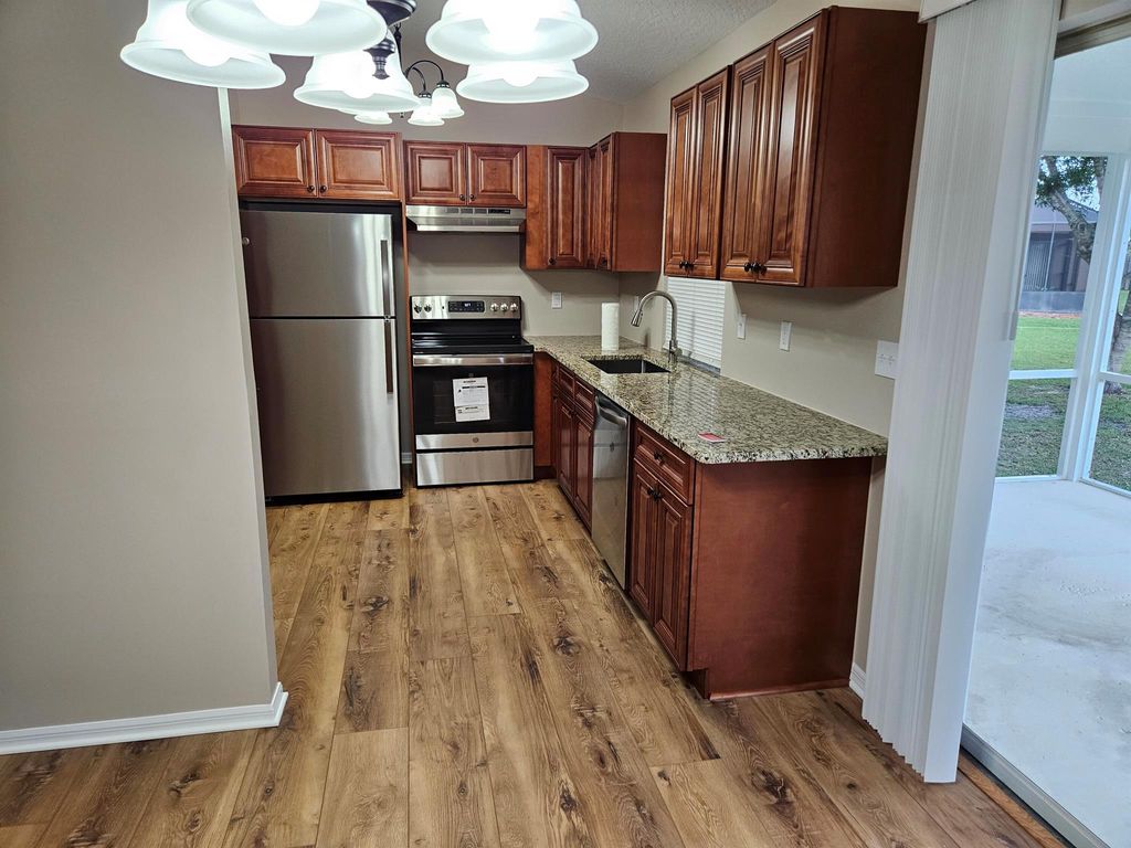 Photo of 5411 NW Arrowhead Terrace, Port St Lucie, FL 34986 (MLS # R10993924)