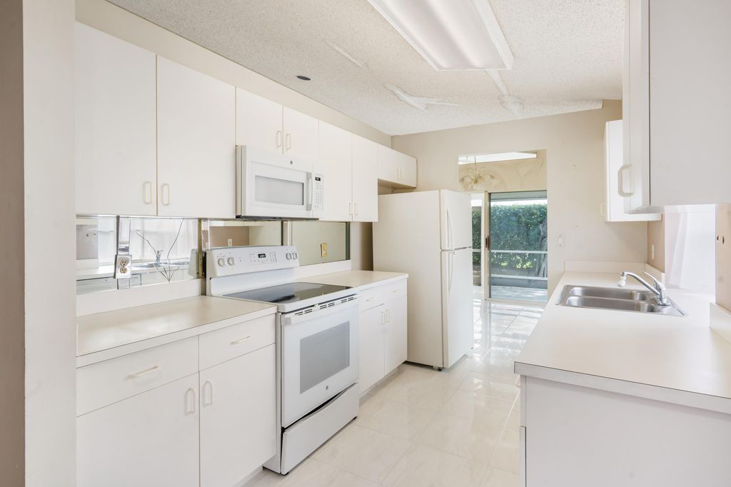 Photo of 6145 Bay Isles Drive, Boynton Beach, FL 33437 (MLS # R10964849)