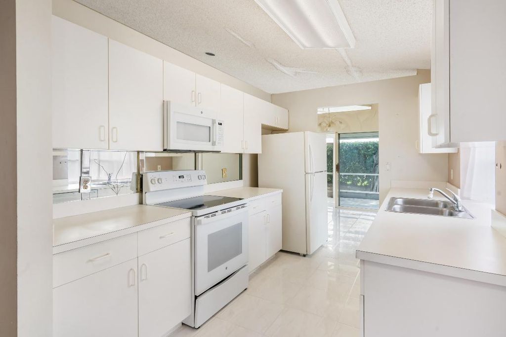 Photo of 6145 Bay Isles Drive, Boynton Beach, FL 33437 (MLS # R10964849)