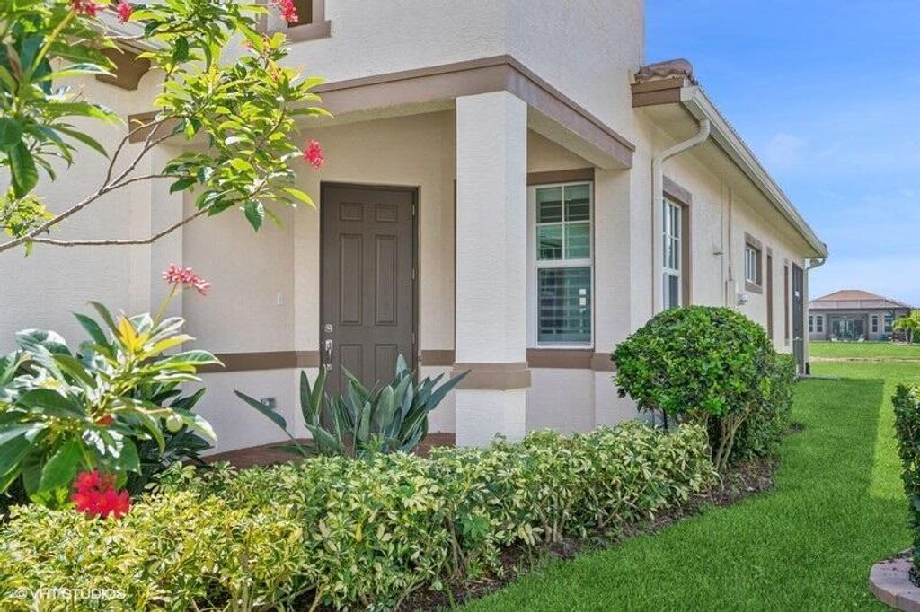 Photo of 9155 SW Michele Way, Port Saint Lucie, FL 34987 (MLS # R11101786)