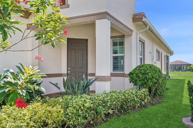 Photo of 9155 SW Michele Way, Port Saint Lucie, FL 34987 (MLS # R11101786)