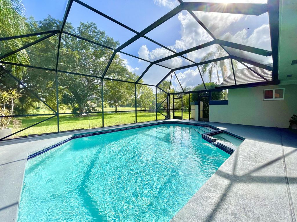 Photo of 11933 Waterwood Drive, Boca Raton, FL 33428 (MLS # R11159970)