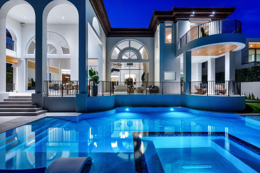 COMPLETELY REBUILT DIRECT INTRACOASTAL HOME IN 2022! 1131 Spanish River Road by Marc Julien Homes is a testament to timeless architecture while offering the highest standards of contemporary, modern day living. This completely reimagined and rebuilt Mediterranean Masterpiece is located in the famed ''Estate Section'' of Spanish River Land and sits on an oversized 17,000 SF lot with 100 feet of direct Intracoastal frontage. Offered furnished and in turn-key condition, the nearly 9,000 SF under air waterfront estate boasts 6 ensuite bedrooms, 8 and a half baths with captivating water views throughout all of the main living spaces. The residence is equipped with complete high-impact glass protection, a three-car garage, a new full-house generator, and is powered by Control-4 Home Automation Featuring incredible ceiling heights and top of the line finishes throughout, this home is truly a must see in person to appreciate the rare, grandiose scale. Just steps to beautiful beaches, world-class shopping and dining and the Boca Raton Resort, 1131 Spanish River Road is the most unique and impressive offering on the market in East Boca Raton. Call for a private showing.