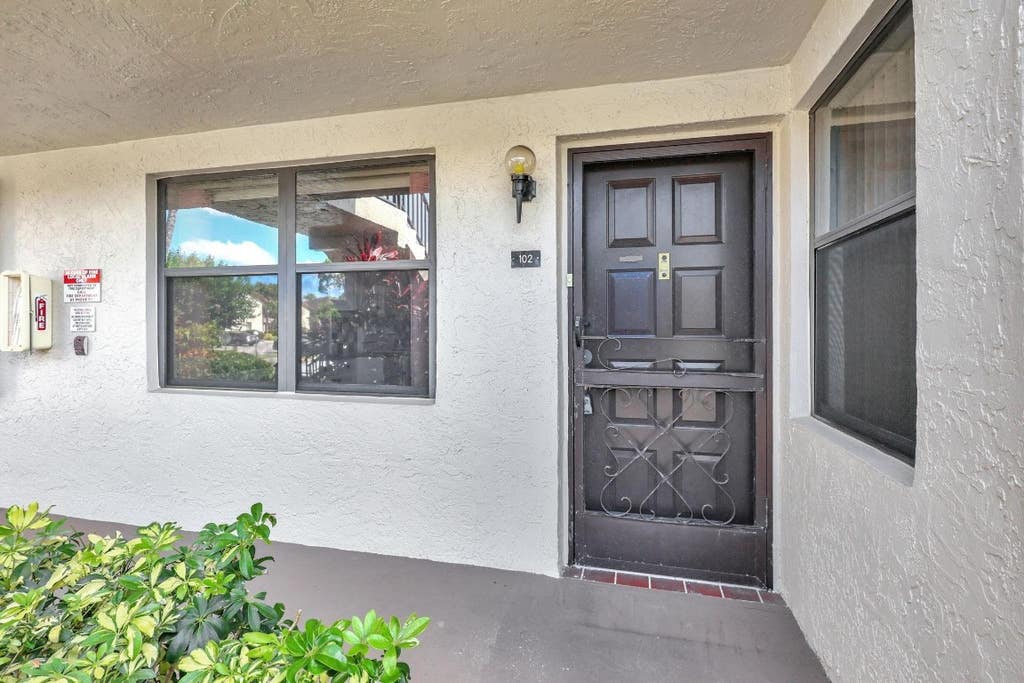 Photo of 7650 Tahiti Lane #102, Lake Worth, FL 33467 (MLS # F10489842)