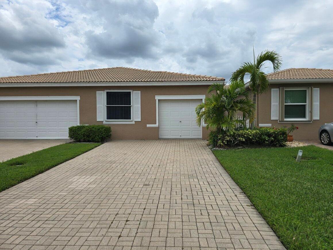 Located in the desirable gated community of Andros Isles, this beautifully maintained 1-story villa offers the perfect blend of comfort and convenience. Featuring 3 bedrooms, 2 bathrooms, and a 1-car garage, the home is move-in ready with fresh paint throughout and permanent hurricane protection for peace of mind.Enjoy tranquil lake views from the spacious screened patio, ideal for relaxing or entertaining. Inside, the open layout provides a light and airy feel, making every room both functional and inviting.Andros Isles is a manned-gated community that offers resort-style amenities including a swimming pool and spa, tennis courts, basketball courts, bocce courts, a children's playground, a clubhouse with fitness center and exercise room, and scenic walking paths.