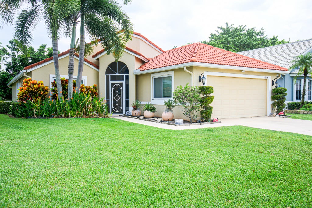 Photo of 7774 Stirling Bridge Boulevard S, Delray Beach, FL 33446 (MLS # B26054850)
