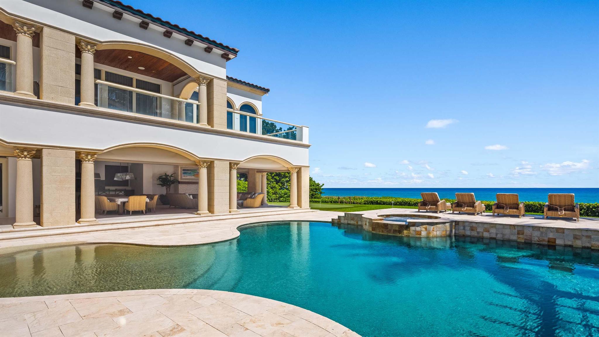 Introducing a one-of-a-kind oceanfront masterpiece in the prestigious Town of Highland Beach. Situated on 100 feet of direct ocean frontage with over 400 feet of depth, and almost 600 feet from the road to the water, this spectacular estate offers unparalleled luxury and privacy. Impeccable custom designer finishes elevate every aspect of this immaculate property. The residence boasts a stunning oceanfront pool complemented by a unique indoor pool and spa for year-round enjoyment. The expansive layout includes designer gourmet kitchen; two substantial offices that cater to modern work-from-home needs; state-of-the-art theater; and game room. With breathtaking views creating a sanctuary-like atmosphere and an oasis for relaxation, the primary suite has two separate baths with steam shower