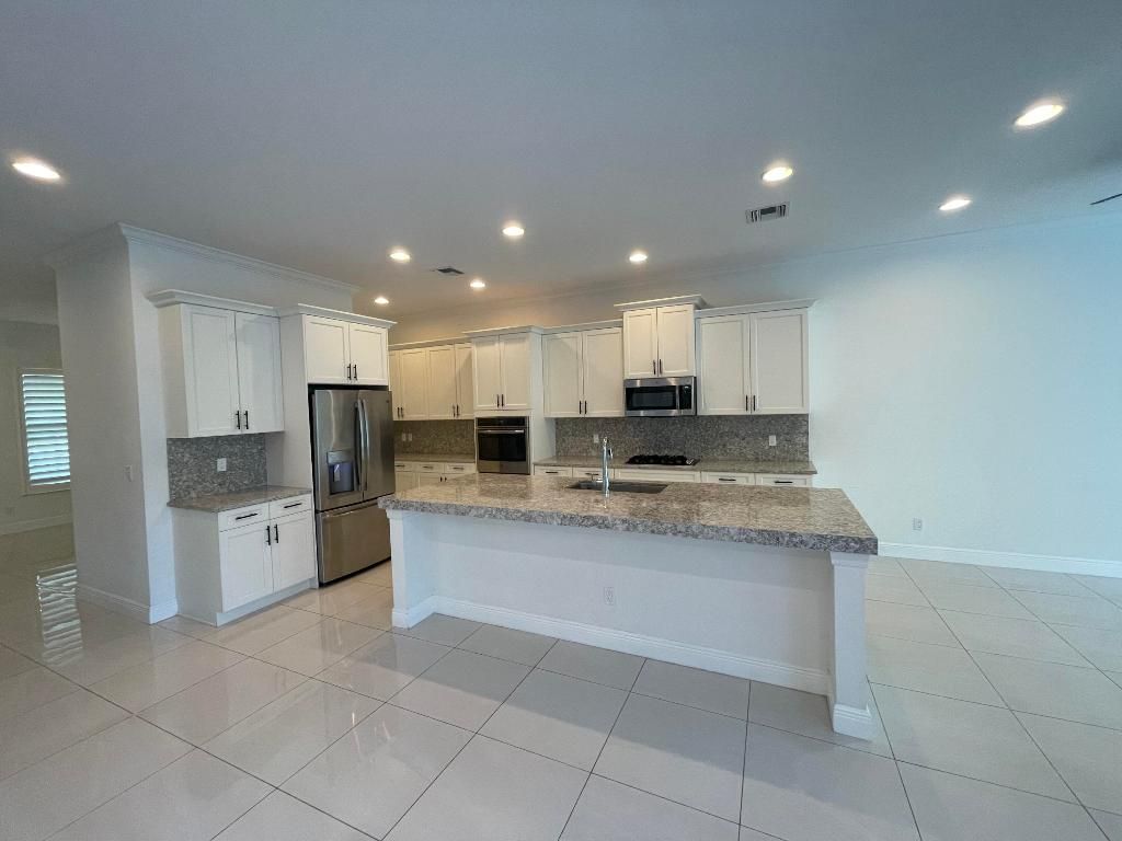 Photo of 2098 Dickens Terrace, Palm Beach Gardens, FL 33418 (MLS # R10923850)