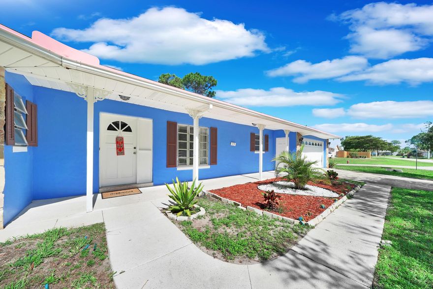 Sensational 3 bedroom, 2.5 bath 2 car garage corner unit centrally located in Port St. Lucie. Situated on a spacious corner with plenty of room for a boat, RV etc. Luscious trees surround the property giving a sense of peace & tranquility. Recently painted exterior & manicured lawn. Upon entering the inside you will be welcomed with tile floors throughout, remodeled kitchen with quartz counter tops, newer cabinets & stainless steel appliances. Floor plan consists of living room, family room, dining room, 3 bedrooms on one side with a spare area off the family room that could be used as a 4th bedroom, office etc. Washer & dryer room that leads to the half bathroom & garage. Come add your finishing touches & make this house your home. Roof 2018, A/C 2005, Water heater 2023 & NO HOA.