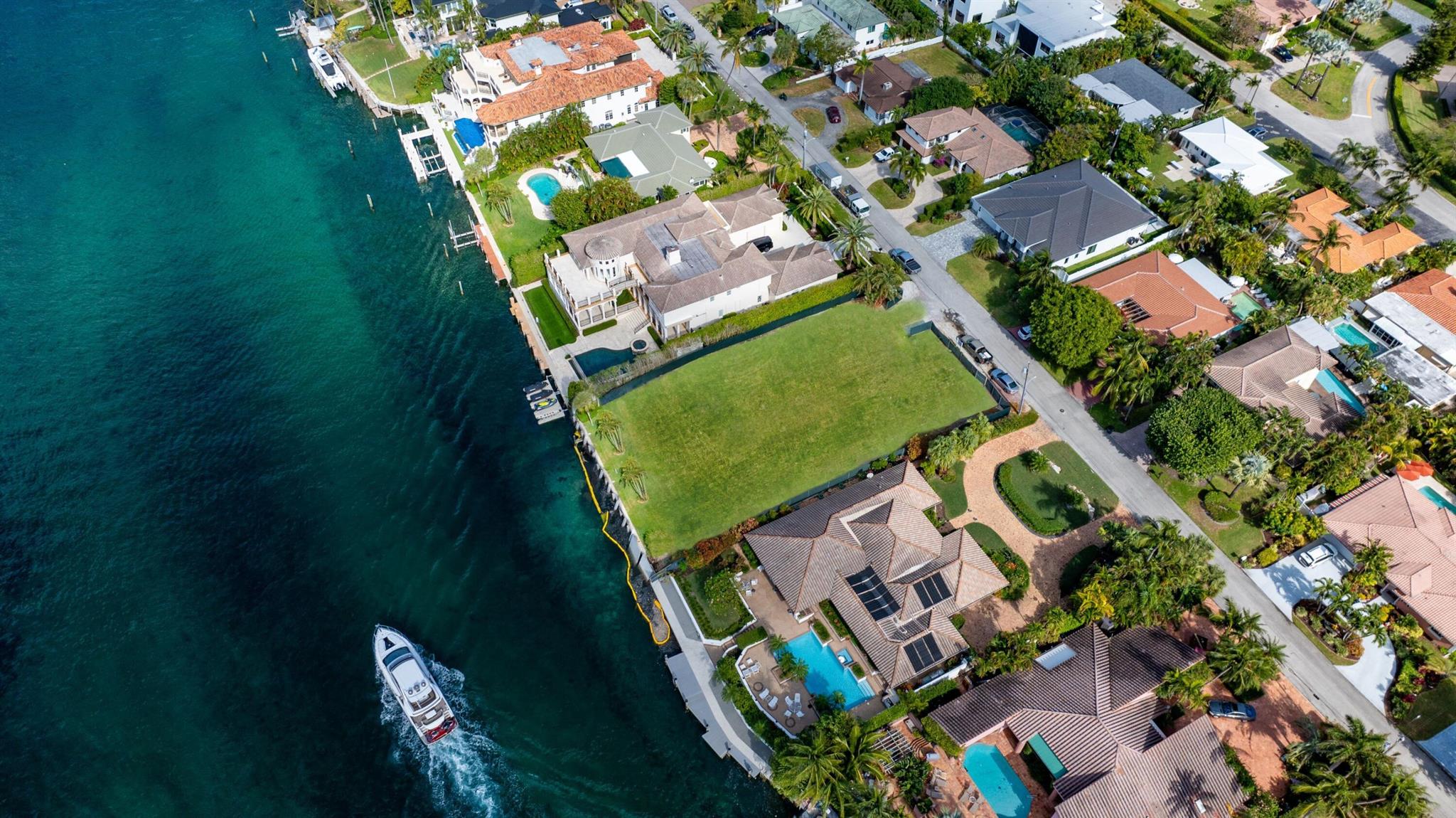 Premier Boca Riviera Intracoastal Lot sited on 96 +/- feet of waterfrontage in a ''No Wake'' zone minutes to the Boca Inlet, Boca Beaches, Downtown Boca Raton restaurant/shopping row and Mizner Park. Build your dream estate on the prime and sought-after parcel with new concrete seawall. Proposed '' Farmhouse Modern'' plans by famed architect Randall Stofft and high-styled interiors by Carolina Freye Interiors available to review. Show by appt only.