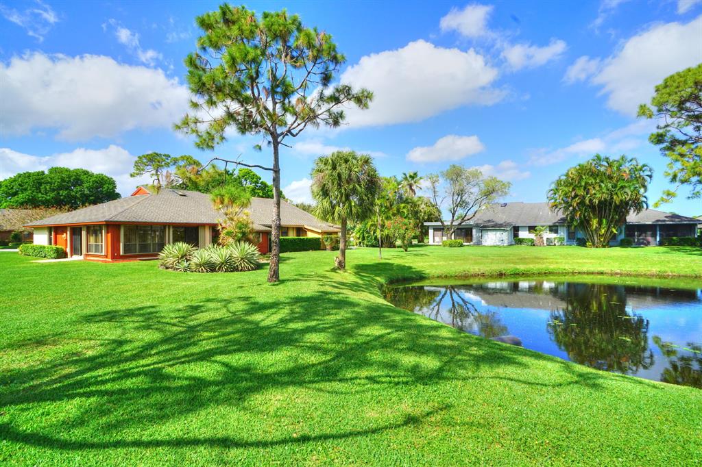 Spacious 2 bedroom, 2 full bath, townhome in the gated Eastpointe Country Club. Features include a huge Florida room, 1 car garage, updated kitchen with granite countertops, fresh paint throughout, brand new bathroom vanities w/ quartz countertops, washer/dryer, storage shed, hurricane shutters, lake views, and an optional social club membership. Good credit and income of 3x rent required. A pet will be considered on a case by case basis with a $500 non-refundable pet fee. 2 vehicle maximum. A VIRTUAL 360 DEGREE TOUR OF ALL ROOMS CAN BE FOUND HERE: https://kuula.co/share/7Jq1M/collection/7lDWR