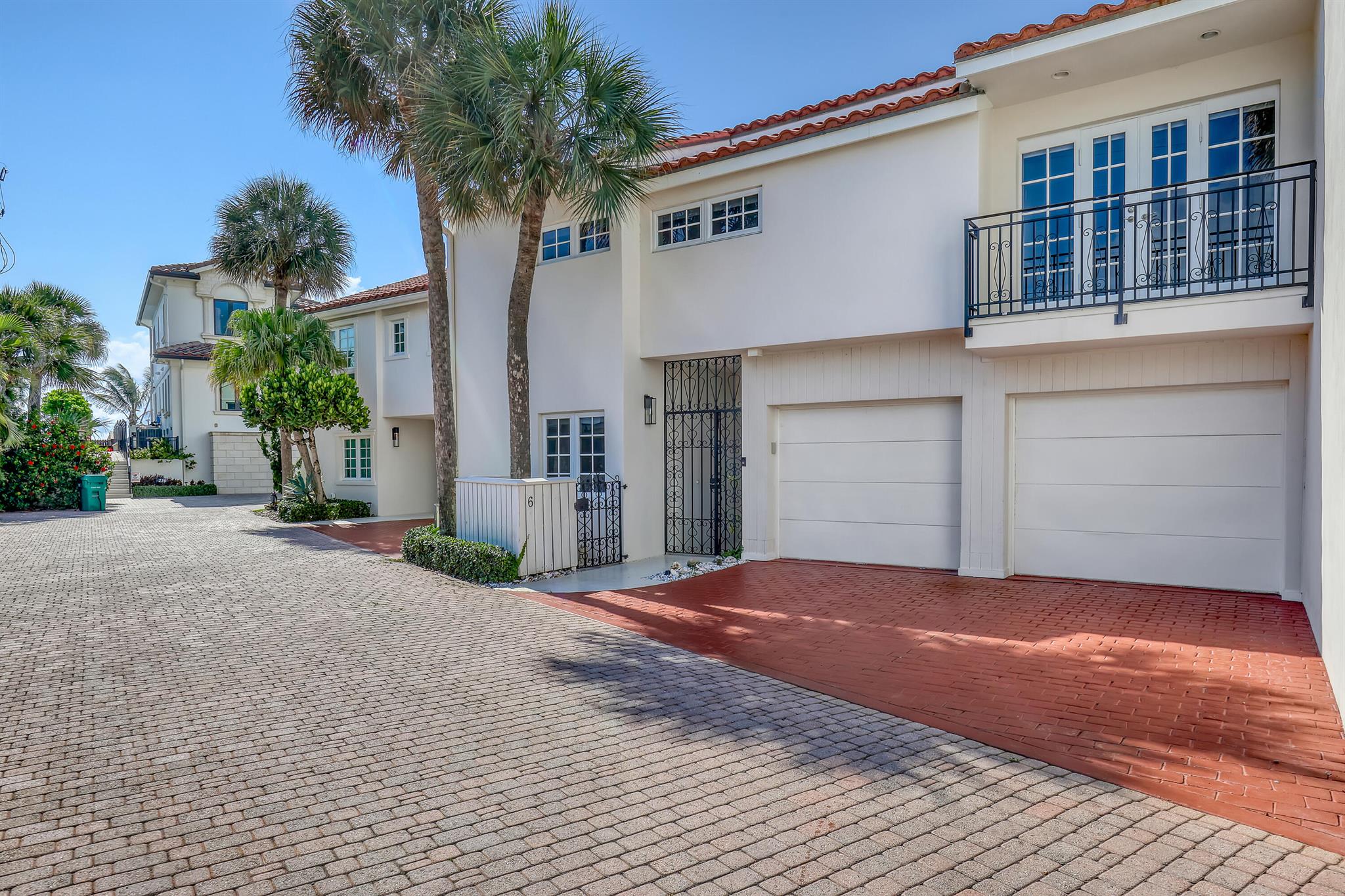 Steps From the Ocean - Coastal Townhome Retreat. Live the ultimate beachside lifestyle in this turnkey, move-in ready fully furnished 2-story townhome located in Wexford Court, an intimate gated community with a pool and private deeded beach access.Enjoy a custom kitchen with quartz countertops, spacious living areas, and a lush private courtyard surrounded by tropical landscaping. Upstairs features master suite, loft, office, gym & balcony access. This wonderful home has impact windows.This rare rental combines comfort, privacy, and unbeatable coastal convenience just steps from the sand! Enjoy excellent restaurants and shoping close by & PBI Airport is 20 minutes away. $9,500/Month off-season $20,000/Month seasonal