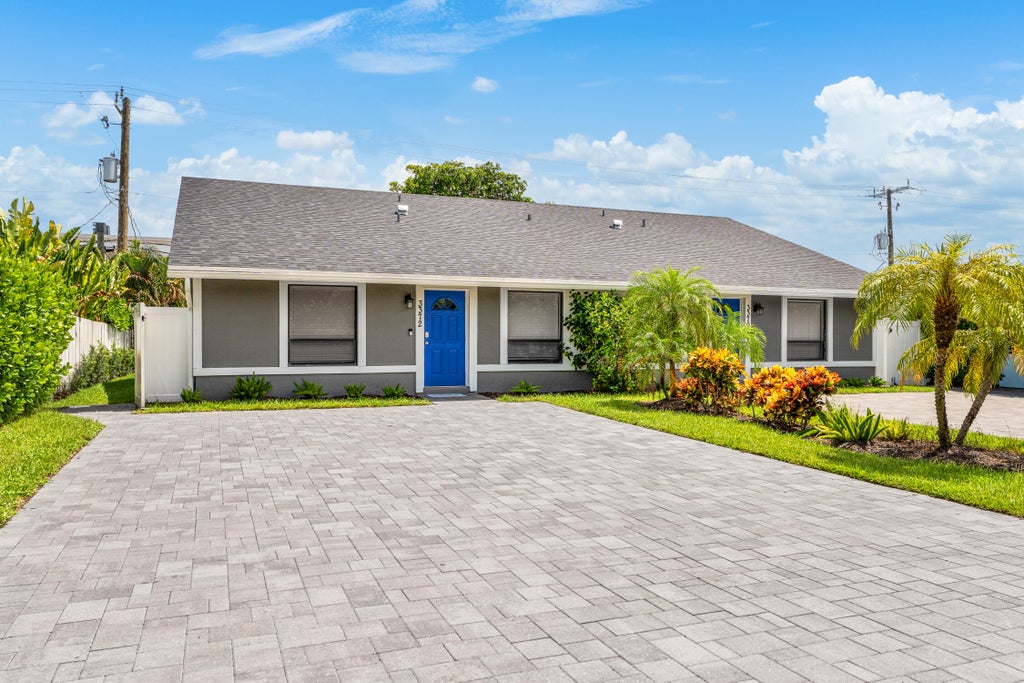 Photo of 3372 NE 5th Drive, Boca Raton, FL 33431 (MLS # B26061685)