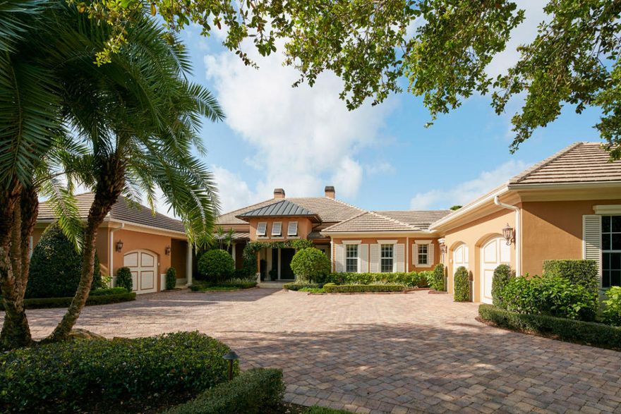 Breathtaking lake view over a stunning free-form pool area from a huge loggia with electric screens that protect your furniture and summer kitchen from inclement weather. This house is special from the formal entry to the loggia fire place where entertaining is indeed a pleasure. Formal living and dining rooms are impressive with tray ceilings and lots of natural light. His/her master bath and spacious his/her closets.Sound system, central vac,drawers in all kit cabs, mud room. A wine cellar next to the butler's pantry are the icing on the cake! Notice the 'living wall' outside on the east side protecting the whole-house generator. Back yard fully fenced. AC's almost new & library that could be 5th bedroom. Kit has office area w/desk. Second dining area off kitchen plus breakfast bar. gas appliances including the 2 fireplaces. Central vac with special access in kitchen for the daily 'crumb sweep'. Cove lighting, tray ceilings, 2 very large new water heaters. Recessed sliding doors open to loggia and summer kitchen extending the living area for entertaining.  Ac's age 2013 and 2014. Note the epoxy surface on garage floors. Tray ceilings are intricate and worthy of note. This was a model home and no stone left unturned. Paddle fansin every room. 6-burner gas stove plus an electric wall oven and microwave. Plantation shutters throughout make this a delightfully easy home to manage. Window screens are easy pop-off to clean. Travertine floors throughout living areas with hardwood master bedroom & library floors and carpeted guest bedrooms. Furn nego.  Equity membership at Medalist Village includes the12-hole, par 3 golf course, the Aussie Pub, The Medalist Village Spa and Clubhouse, two tennis courts and his/hers fitness centers. Initial equity fee of $35,000.00 due at closing; membership dues $1,050.00/qtr. Association dues $625.00/qtr.