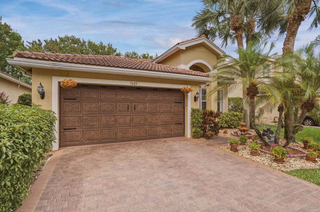 Photo of 7683 Jewelwood Drive, Boynton Beach, FL 33437 (MLS # B26016630)