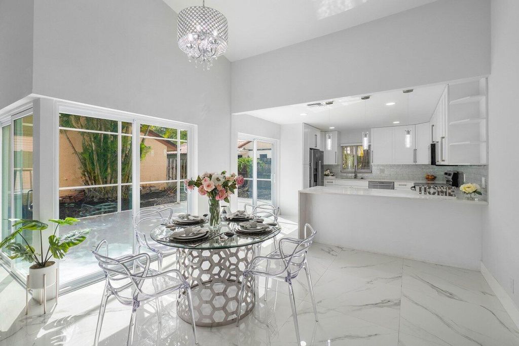 Photo of 2105 NW 15th Place, Delray Beach, FL 33445 (MLS # R11002940)