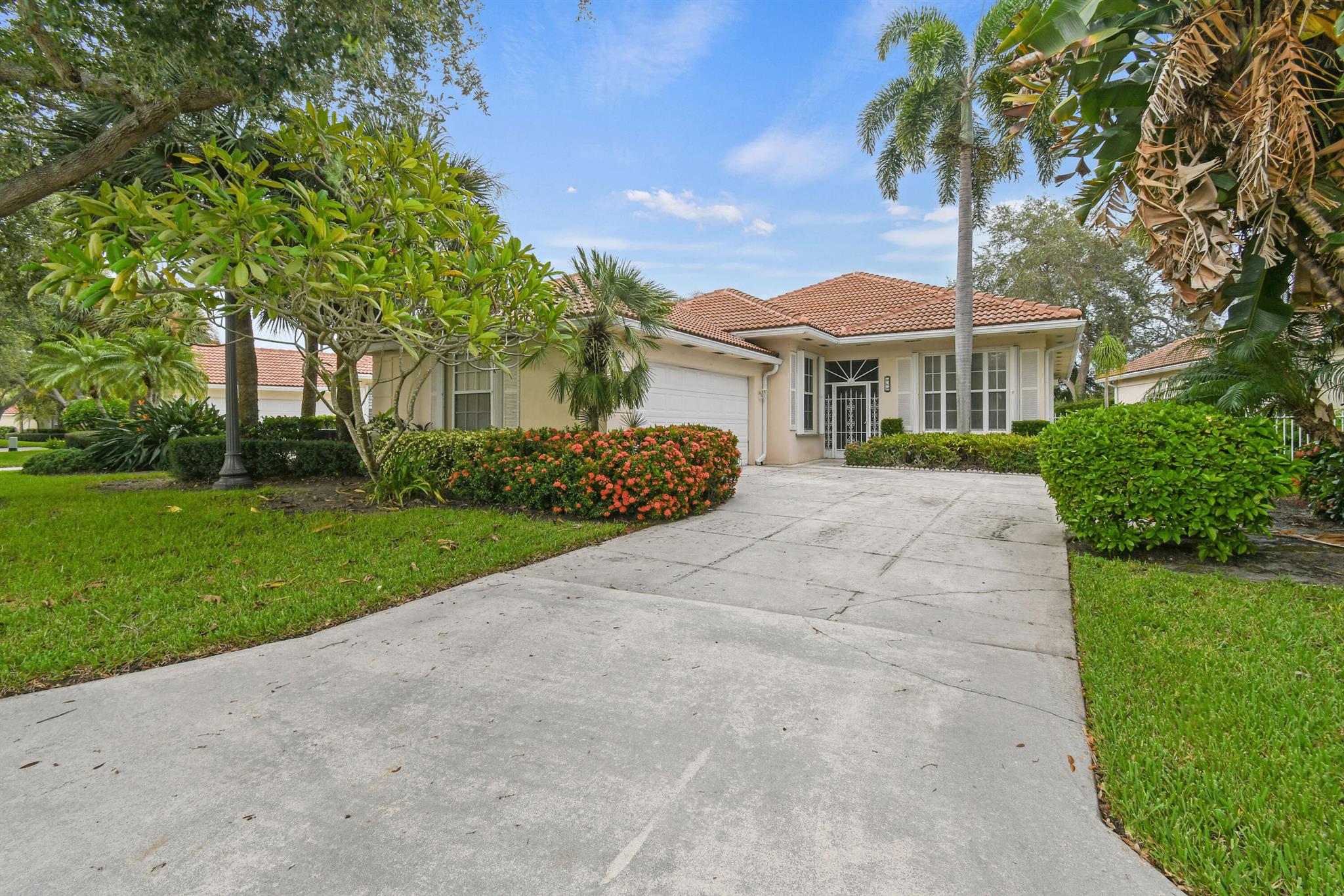 Welcome to Your Chance to Customize Your Own Home!Located in the gated community of Oaks East.This is a solid CBS-built Divosta home with three bedrooms, two bathrooms, and a spacious single-story open floor plan featuring soaring ceilings that flood the home with natural light. In original condition and ready for a complete renovation, this property is the perfect blank canvas to design and finish exactly to your taste.Key features already in place include a new roof, Brand new AC, full accordion shutters, and back patio with electric shutters. Outside, enjoy your own private pool overlooking the calm, tranquil lake with garden views and ideal southeastern exposure -- a peaceful retreat right in your backyard.