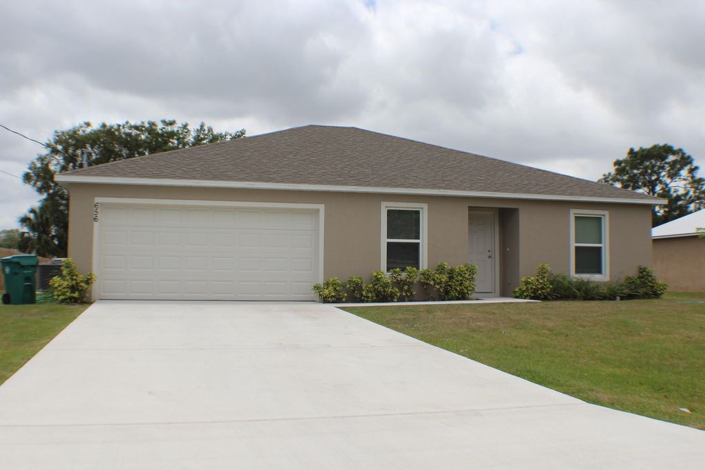 Photo of 656 SW Violet Avenue, Port Saint Lucie, FL 34983 (MLS # R10794959)