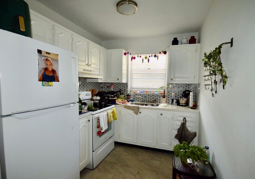 Photo of 1733 N 3rd Avenue #7, Lake Worth Beach, FL 33460 (MLS # F10506537)