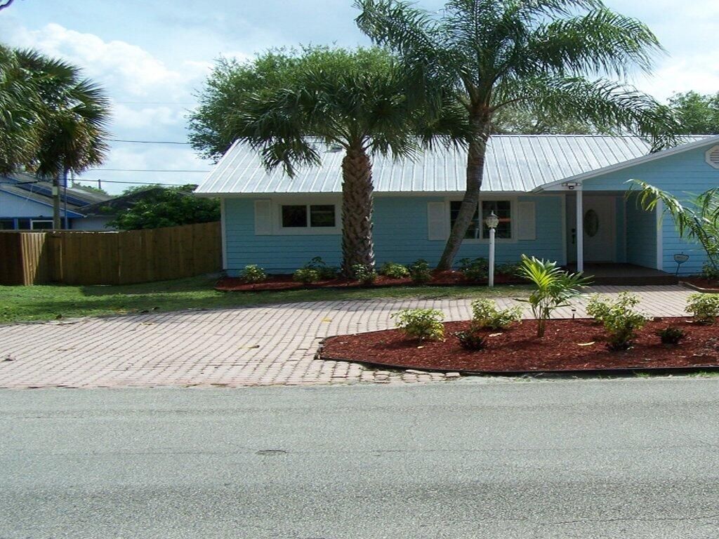 Photo of 2014 SW Sunset Trail, Palm City, FL 34990 (MLS # R10969653)