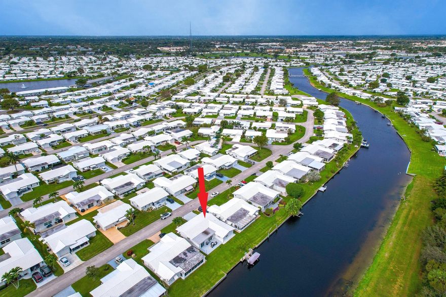 New tile roof (2023), new water heater (2023), new 7000 pound remote controlled Deco elevator boat lift and dock (both installed in 2022), new insulation (2024), and auto irrigation system feeding off the canal to save you money.