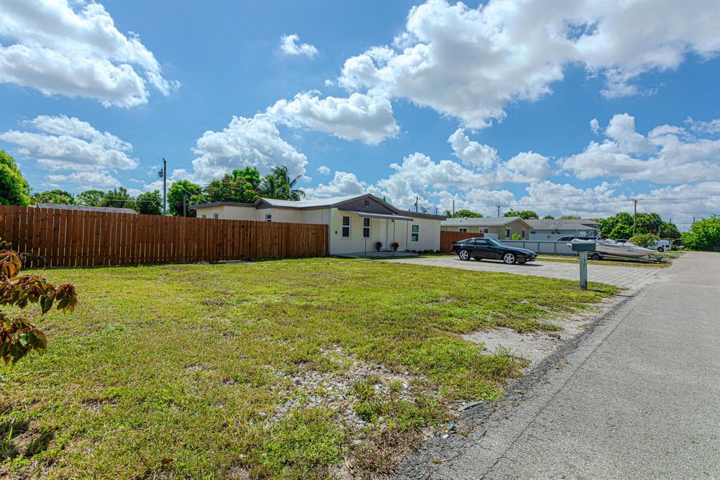 Photo of 696 Neptune Street, West Palm Beach, FL 33406 (MLS # R11118299)