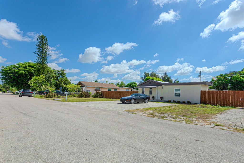 Photo of 696 Neptune Street, West Palm Beach, FL 33406 (MLS # R11118299)