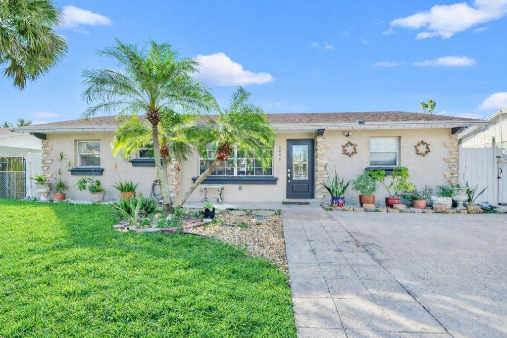 Photo of 5590 S 35th Court, Greenacres, FL 33463 (MLS # F10544953)