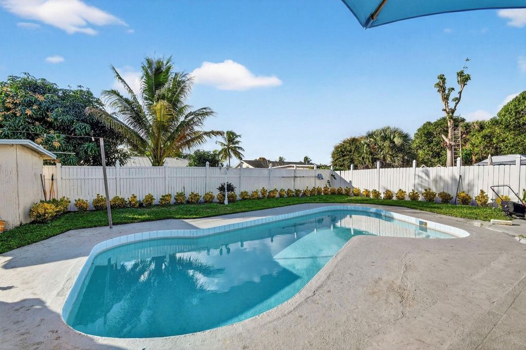 Photo of 5590 S 35th Court, Greenacres, FL 33463 (MLS # F10544953)