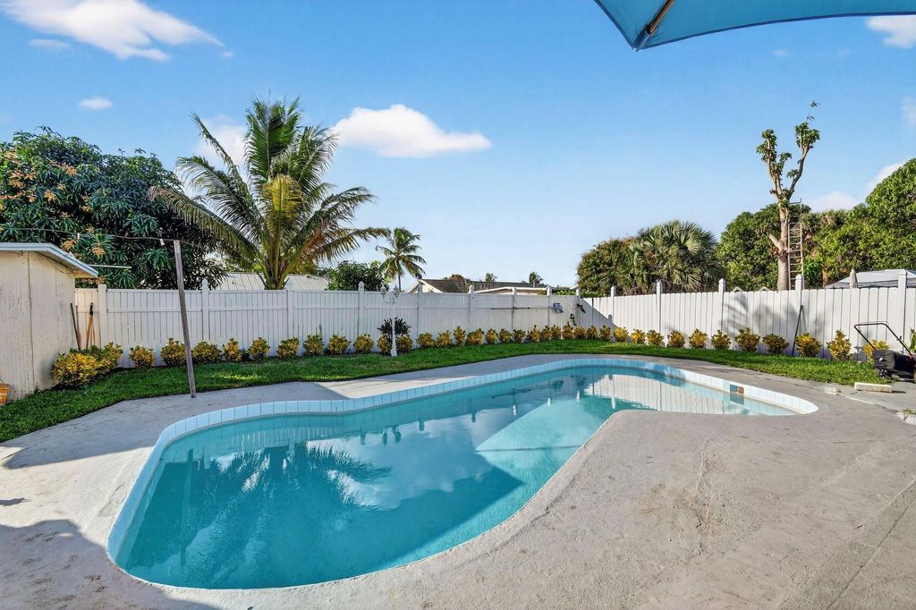 Photo of 5590 S 35th Court, Greenacres, FL 33463 (MLS # F10544953)