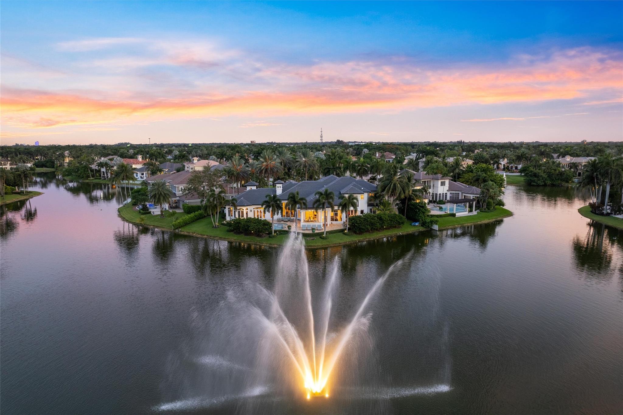 EXPERIENCE THE EPITOME OF LUXURY AT THIS MAGNIFICENT CUSTOM WATERFRONT ESTATE IN EXCLUSIVE
HAWKS LANDING, A GATED RESIDENTIAL COMMUNITY WITH A LIFESTYLE SECOND TO NONE! LOCATED JUST MINUTES FROM FORT LAUDERDALE, THIS EXCEPTIONAL RESIDENCE WITH BREATHTAKING VIEWS BOASTS OVER 8,000 SQUARE FEET OF LUXURIOUS INTERIOR LIVING SPACE AND INCLUDES 7 EN-SUITE BEDROOMS, CLUBROOM/BILLIARD, THEATRE ROOM AND MORE. ORIGINALLY BUILT AS WELL AS RENOVATED BY AWARD WINNING BUILDER/DEVELOPER ROBINETTE HOMES, THIS SPECIAL PROPERTY HAS TOO MANY DESIGNER DETAILS TO MENTION AND MUST BE SEEN TO BE BELIEVED!