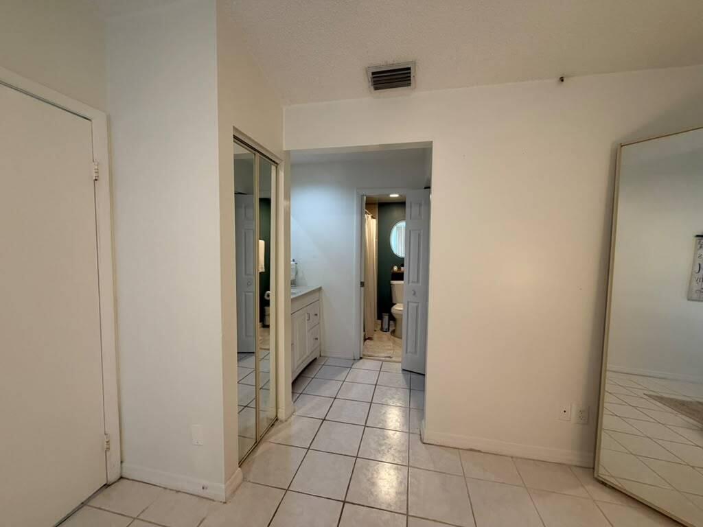 Photo of 1437 ROYAL FOREST Court, West Palm Beach, FL 33406 (MLS # B26081635)