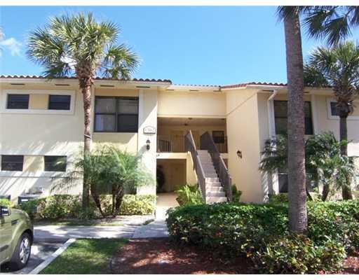 SECOND FLOOR UNIT WITH WATER VIEW. GRANITE COUNTER TOPS IN KITCHEN AND BATHS, S/S RANGE, MICROWAVE AND DISHWASHER, TILE IN LIVING AREAS.