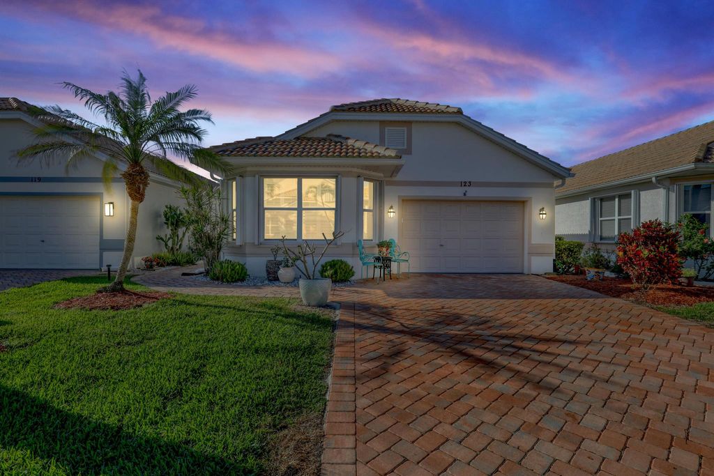 Photo of 123 Pepper Lane, Jensen Beach, FL 34957 (MLS # R10970335)