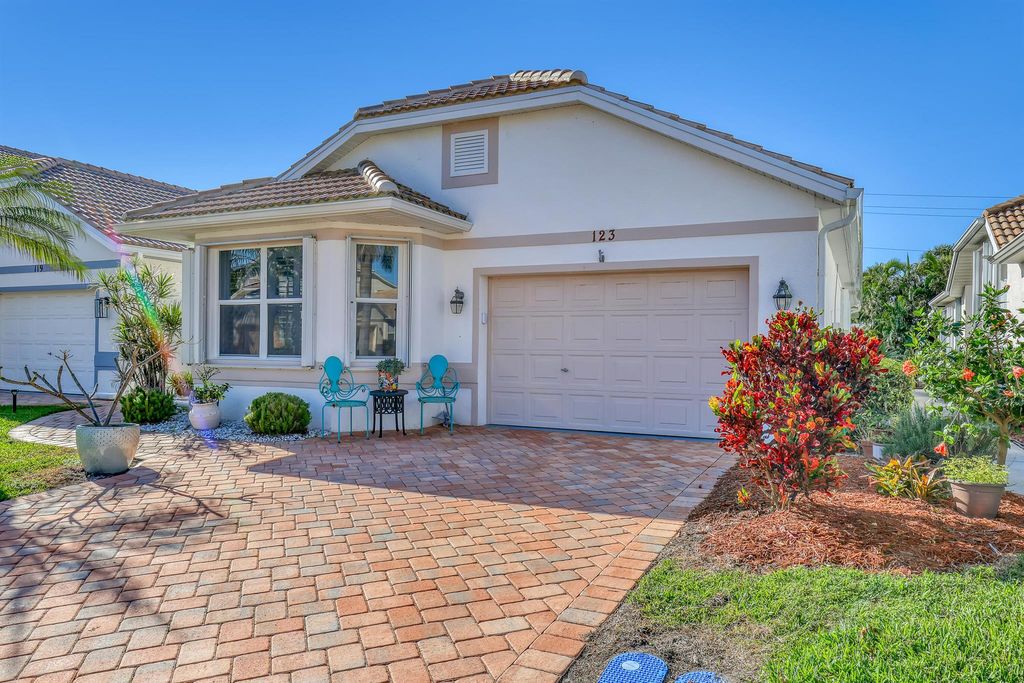 Photo of 123 Pepper Lane, Jensen Beach, FL 34957 (MLS # R10970335)