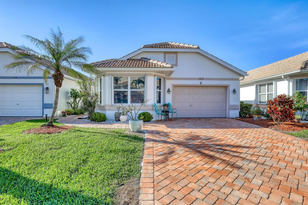 Photo of 123 Pepper Lane, Jensen Beach, FL 34957 (MLS # R10970335)