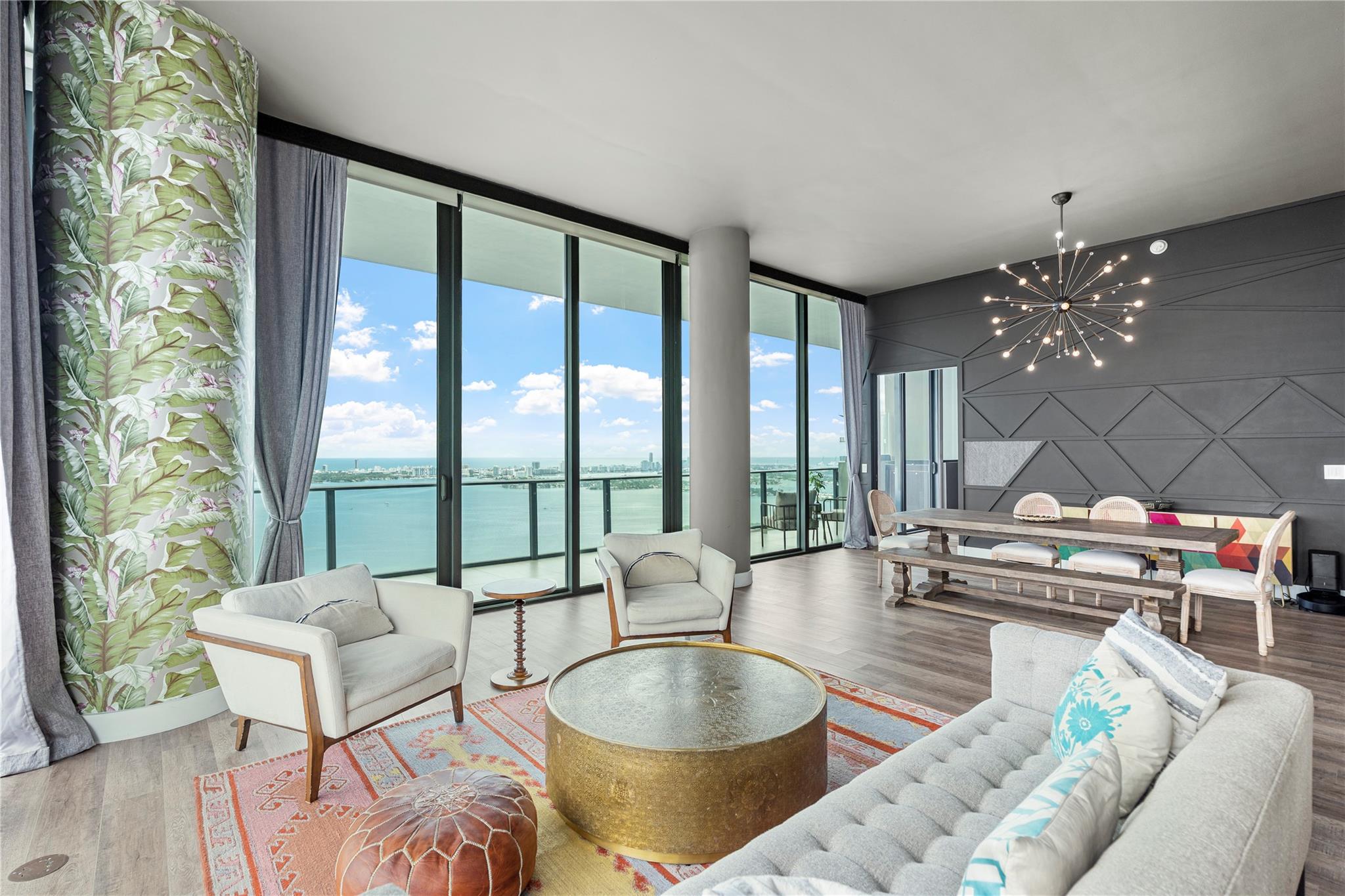 Corner Penthouse with 951 sq ft of a wraparound balcony so you do not miss the sunrise or sunset views. Relax in your outdoor jacuzzi while taking in one of the prettiest views of Miami. 4 bedrooms, 4.5 bath unit contains high-end Italian kitchen finishes, Subzero refrigerator and Wolf appliances. 2 assigned parking spaces. 
Gran Paraiso is one of the best centrally located buildings in Miami. Minutes to I-95, MIA, the beaches, Design District and more. When you live at Gran Paraiso, you are living at a resort. 100ft lagoon shaped pool with towel service, tennis courts, a state-of-the-art gym, a hammam, kids' playroom, a dog park, you'll have to see for yourself.
Unit also available for purchase: $3,495,000